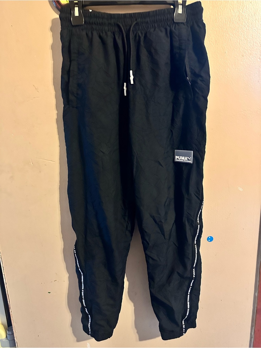 Puma Black Track Pants with White Logo Patch